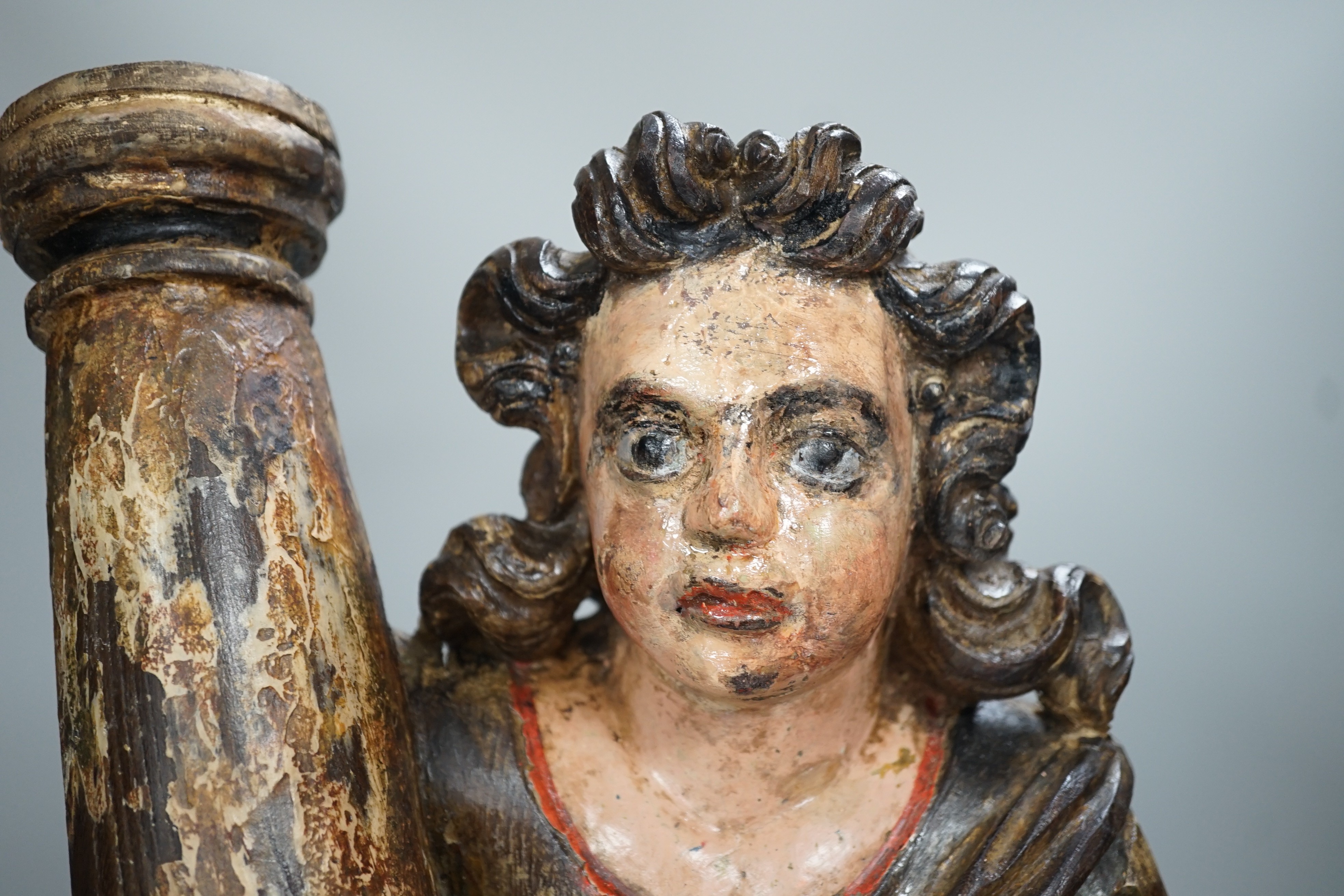 A carved wood polychrome model of a Saint, 53cm